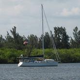Large sailboat moored in river