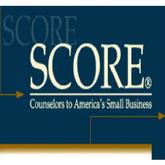 Service Corps of Retired Executives (SCORE.) logo
